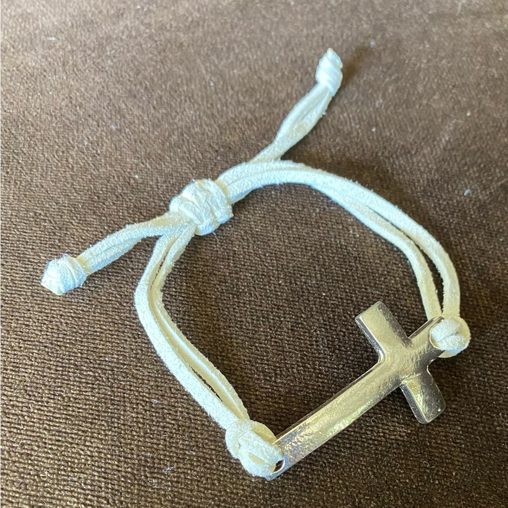 Sideways cross bracelet with adjustable leather straps
